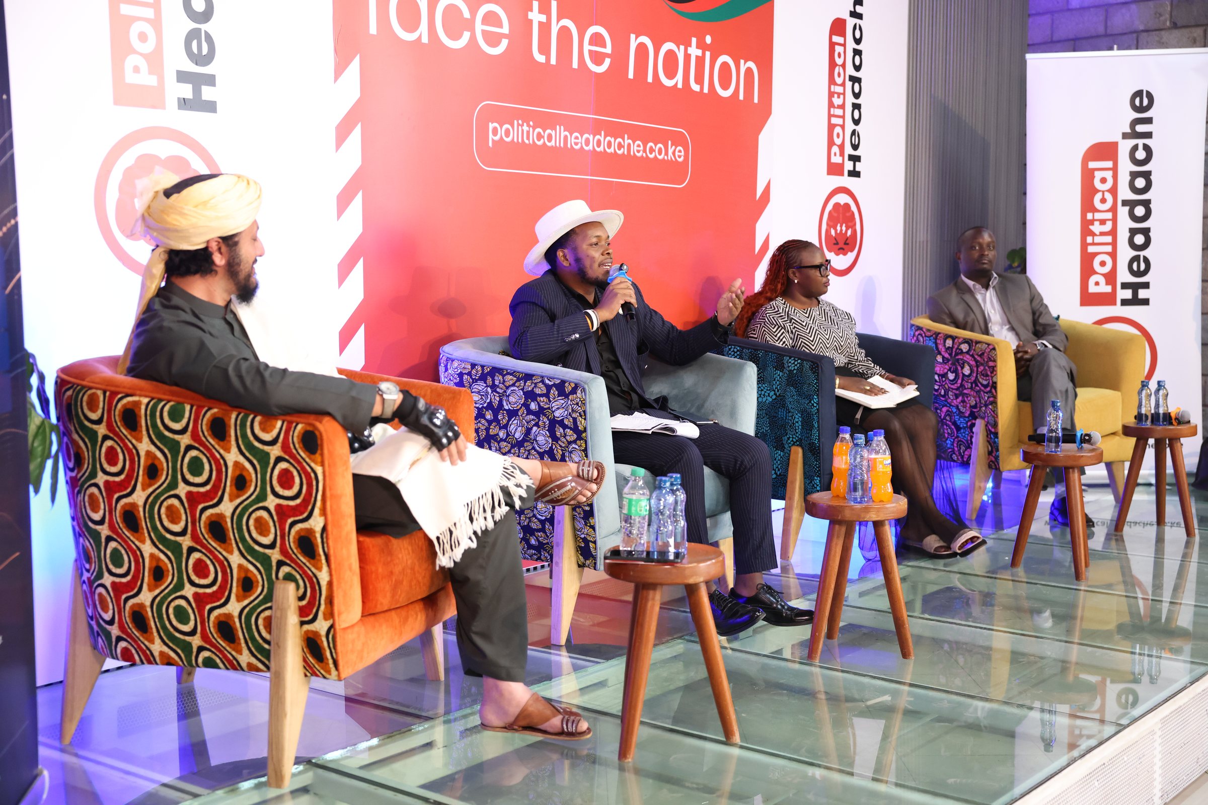 Panelists exchanging views during the town hall