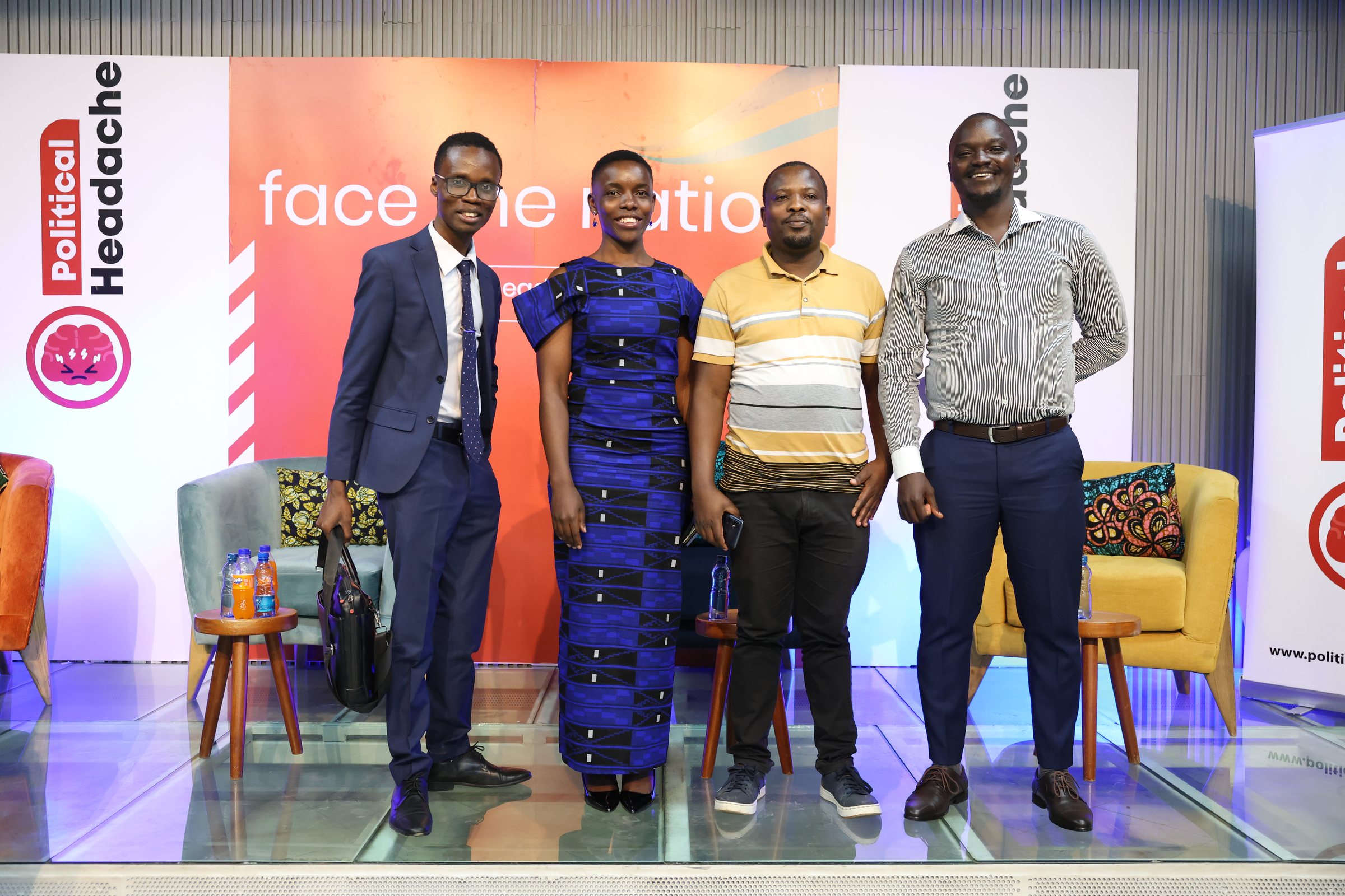 Participants posing together on the Face The Nation stage after the event